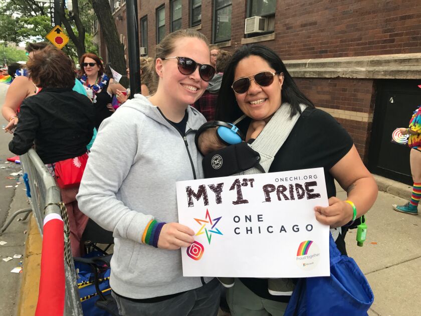 Linsday (left) and Jessica Harding celebrate their first pride with their 3-month-old son, Jacoby. | Jacob Wittich/Sun-Times