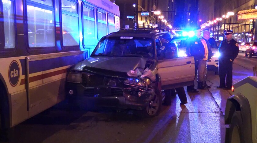 A Mitsubishi Montero rear-ended a CTA bus and a Chicago Police squad car early Thursday in the 500 block of South State Street. | Network Video Productions