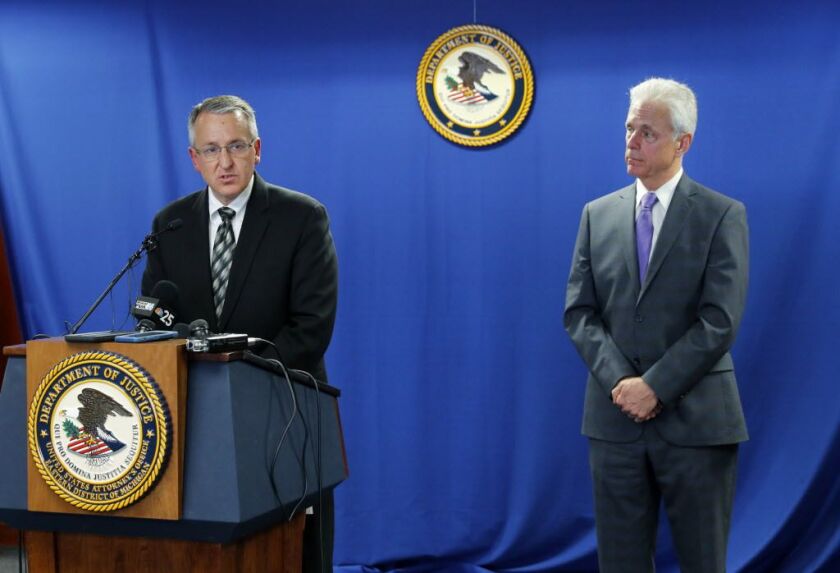 David P. Gelios (left), Special Agent in Charge, Detroit Division of the FBI, and Daniel L. Lemisch, Acting U.S. Attorney of the Eastern District of Michigan, speak during a news conference in Detroit, Thursday, June 22, 2017. | Paul Sancya/AP