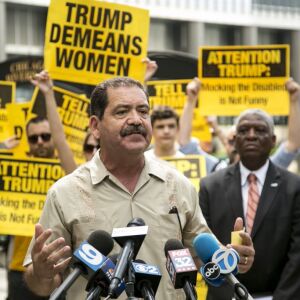 Cook County Commissioner Jesus ‘Chuy’ Garcia speaks against Republican presidential candidate Donald Trump’s “abhorrent language” outside the Trump Tower downtown, Tuesday morning, July 12 2016. | Ashlee Rezin/Sun-Times