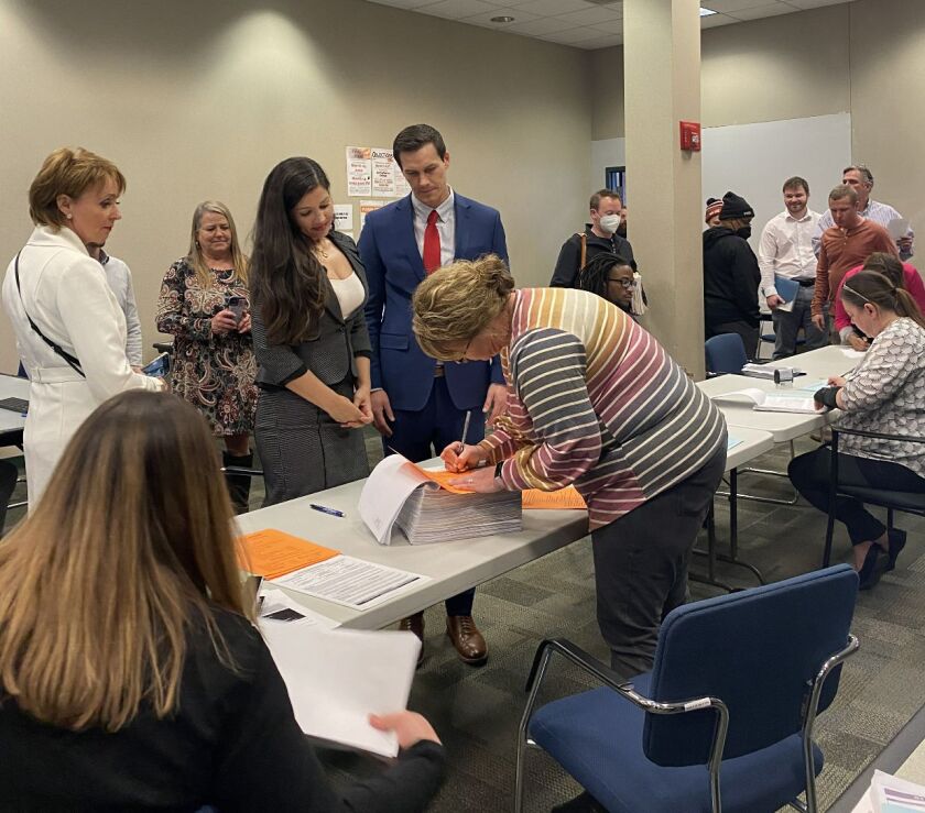 Republican Jesse Sullivan and running mate, Kathleen Murphy, file their petitions to run for governor and lieutenant governor on Monday.