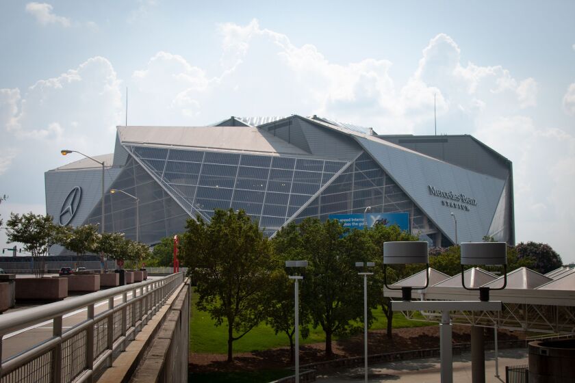 Kanye West has been living inside the Mercedes-Benz Stadium in Atlanta while working on his new album. A representative for the performer said West planned to remain inside to complete “Donda,” his 10th studio album.