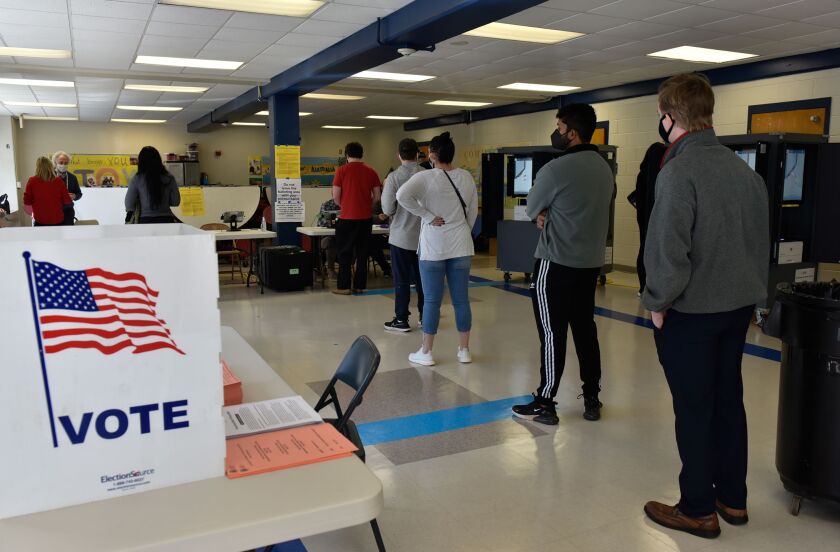 Voters go to the polls at Sara Smith Elementary School in Atlanta during the Georgia runoff elections on Tuesday.