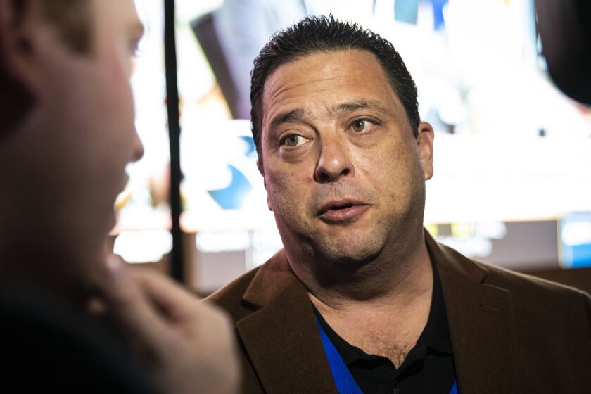 State Rep. Bob Rita, D-Blue Island, chats with a reporter during the opening of Illinois’ first sportsbook, at Rivers Casino in Des Plaines, in March.