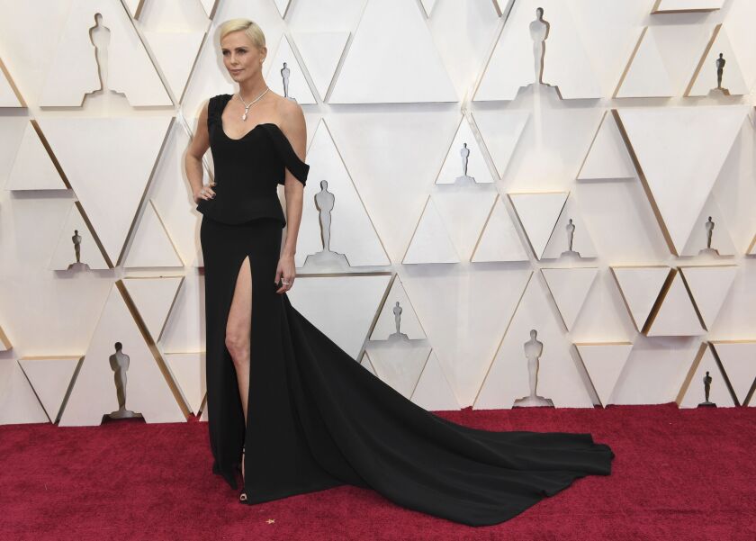 Charlize Theron arrives at the Oscars on Sunday, night wearing Dior Haute Couture.