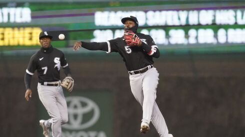 The White Sox’ Josh Harrison throws to first for an out against the Cubs at Wrigley Field on May 3, 2022.