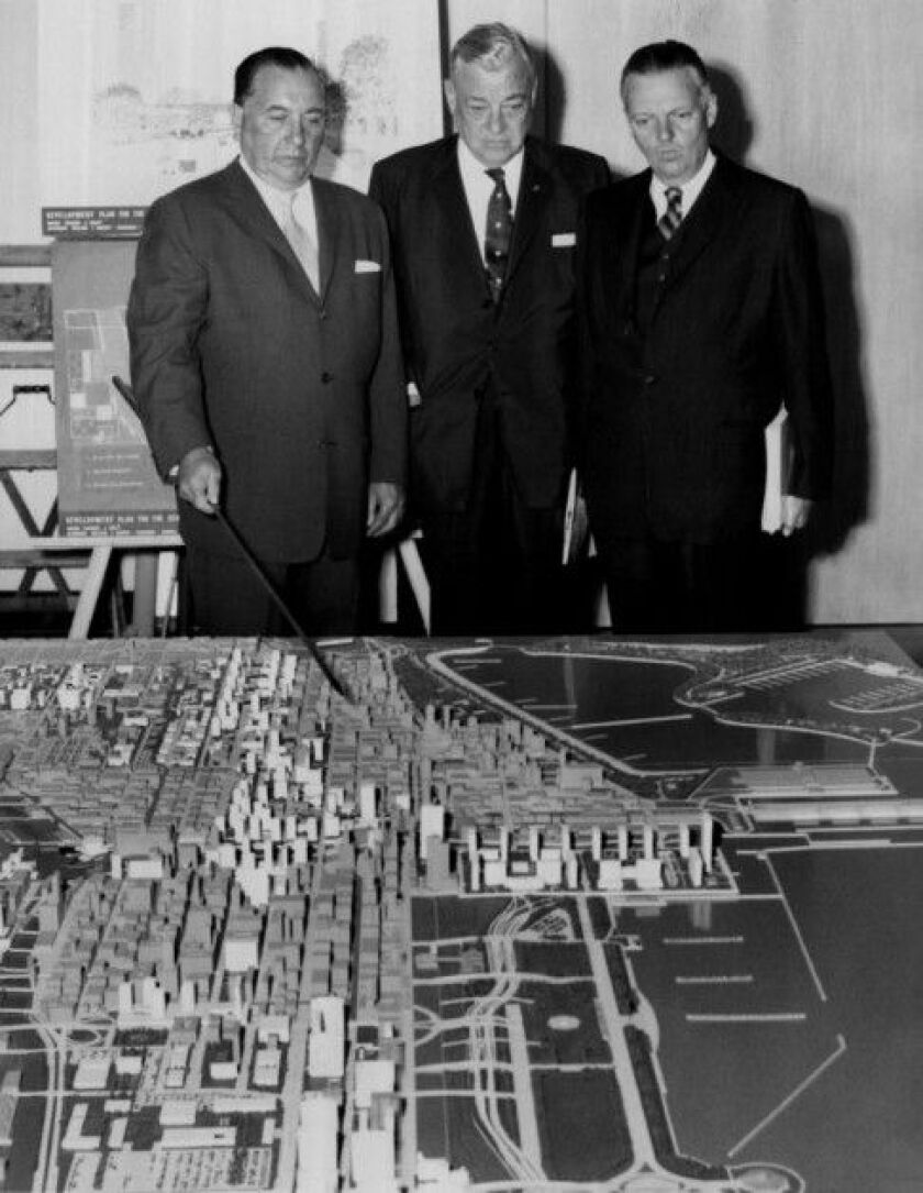 Mayor Richard J. Daley (left) and Cook County Board President Dan Ryan (center) look at a concept model of a downtown development in September 1958. | Sun-Times file photo