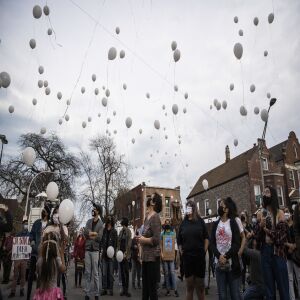 Dozens of people release balloons during a vigil for 13-year-old Adam Toledo near the location of the shooting at West 24th Street and South Sawyer Avenue in Little Village, Monday afternoon, April 5, 2021. Toledo was fatally shot in the chest by a Chicago police officer in an alley west of the 2300 block of South Sawyer Avenue near Farragut Career Academy High School.