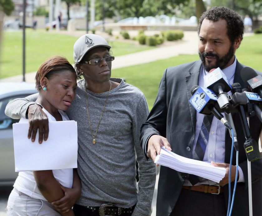 Family members of Sylville Smith (left) and their attorney speak to the media Wednesday, June 21, 2017, in Milwaukee after former Milwaukee police officer Dominique Heaggan-Brown was acquitted of first-degree reckless homicide in the killing of Smith. | M