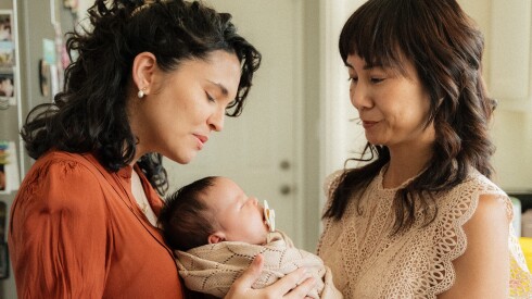 Kim and Katerine Ricardo pose for pictures with their baby girl.