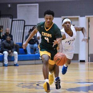 Brooks’ Isaiah Tolbert (1) tries to knock the ball away from Ag. Science’s Corey Jones (4) Thursday 01-10-19. Worsom Robinson/For the Sun-Times.