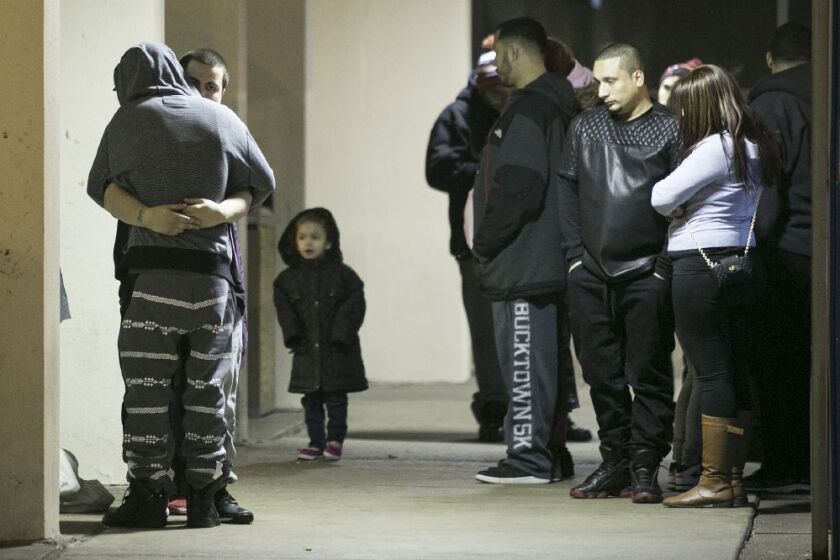 Family and friends gather outside Mount Sinai Hospital after a 3-year-old boy was shot in the head in the 1000 block of North Francisco late Saturday, Oct. 17, 2015. | Ashlee Rezin/For the Sun-Times