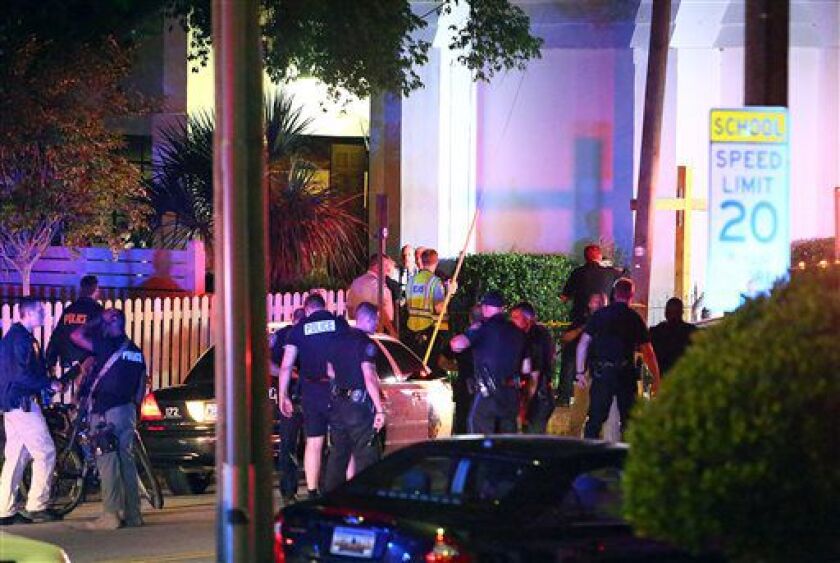 Police stand outside the Emanuel AME Church after a shooting Wednesday evening in Charleston, S.C. | Wade Spees/The Post And Courier via AP