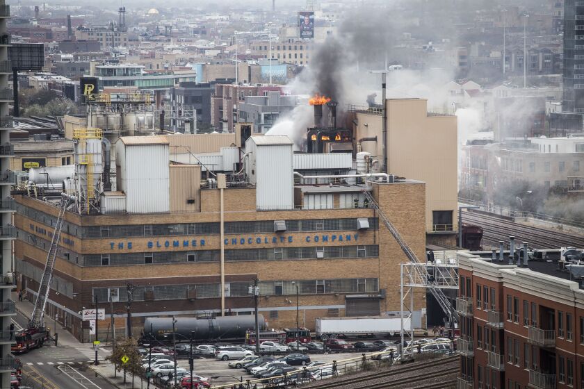 There were no injuries reported from a fire on the roof of the Blommer Chocolate Co. fire Tuesday afternoon. | Rich Hein/Sun-Times