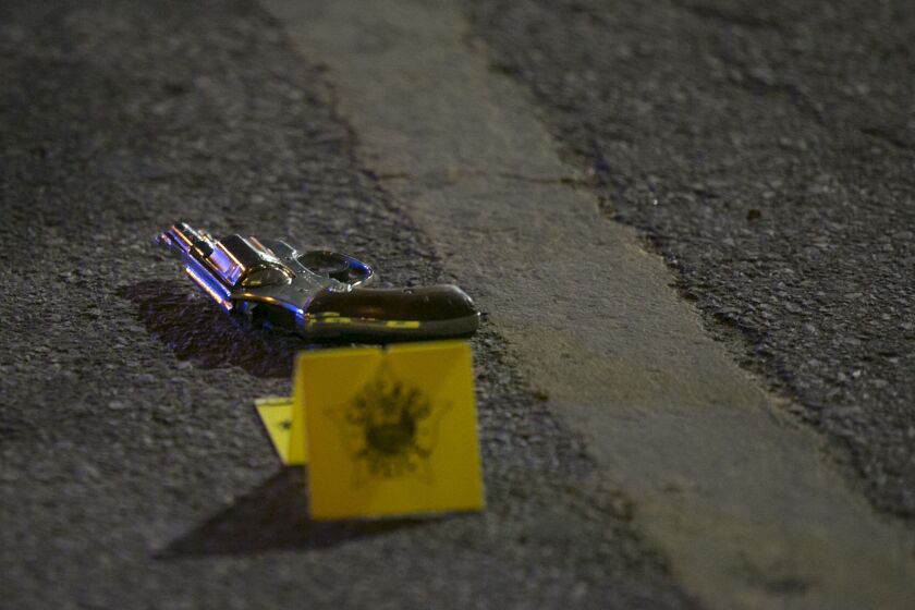 A gun was recovered outside FoodSmart Urban Market, 2901 W. Armitage Ave., where two men were shot Wednesday night, May 13, 2015. | Ashlee Rezin/for Sun-Times Media