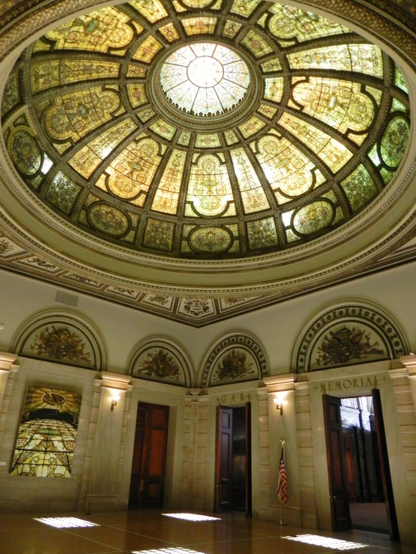 The dome and interiors of the Grand Army of the Republic Memorial Hall and Rotunda of the Chicago Cultural Center were designed by the Tiffany Glass and Decorating Co., a predecessor of the better-known Tiffany Studios.