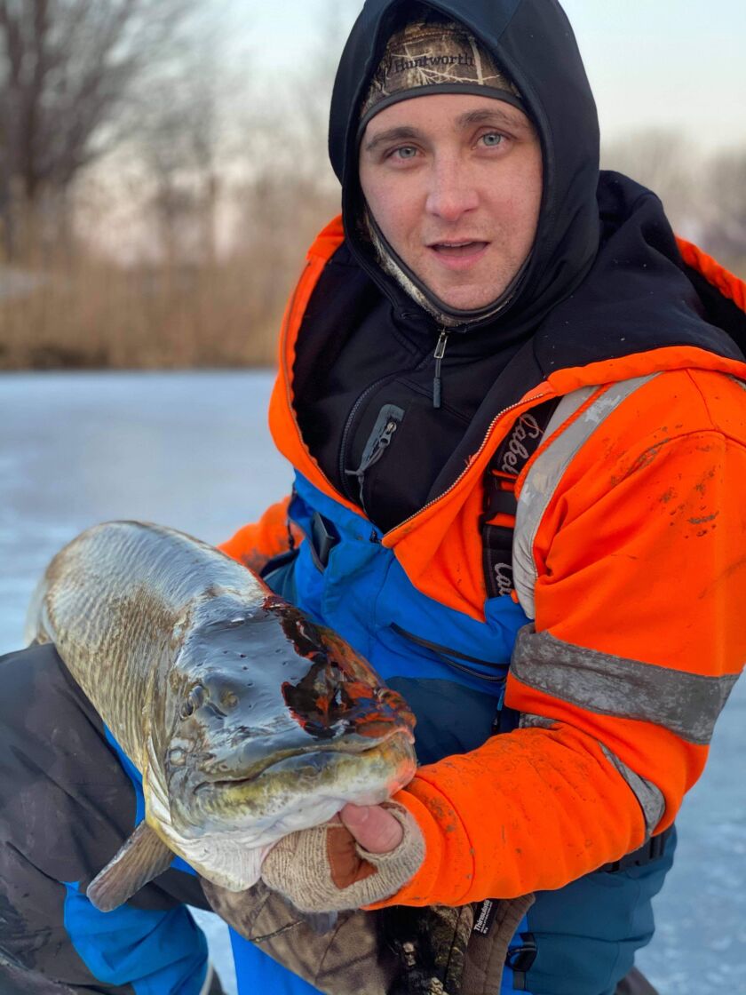 Luis Gonzalez with his 52-inch muskie caught ice fishing Jan. 12 in Lake County.