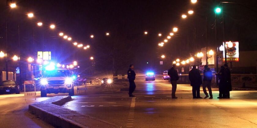 Parts of Halsted were closed for several hours after a man was shot while driving on the 12700 block. He crashed into a pole while driving in the 12900 block of Halsted and was later pronounced dead. | Justin Jackson/ Sun-Times