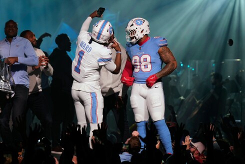 Quarterback Cam Ward, left, and defensive tackle Jeffery Simmons model the Titans' new uniforms. Tennessee was one of five teams to unveil changed designs this offseason.