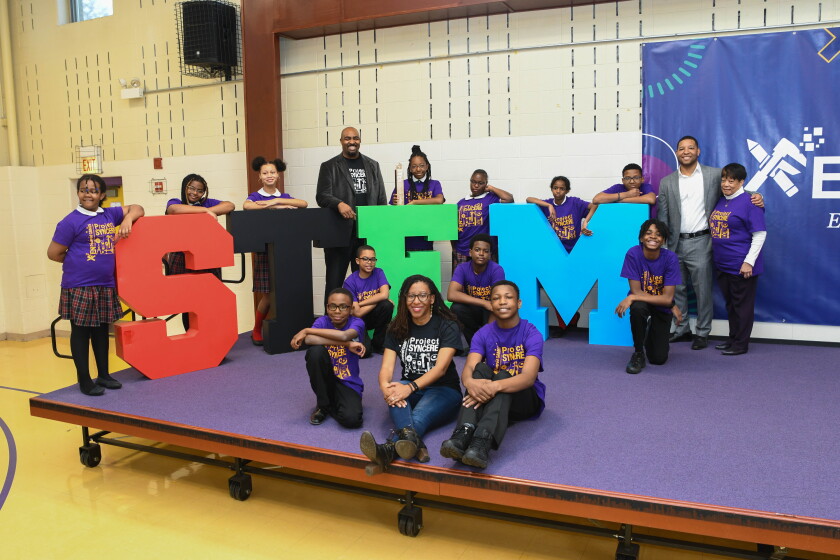 Project SYNCERE leaders pose with students from the Amelia Earhart School at the award ceremony for the ENpowered Games hosted at Earhart Friday, May 6, 2022. Earhart placed third.