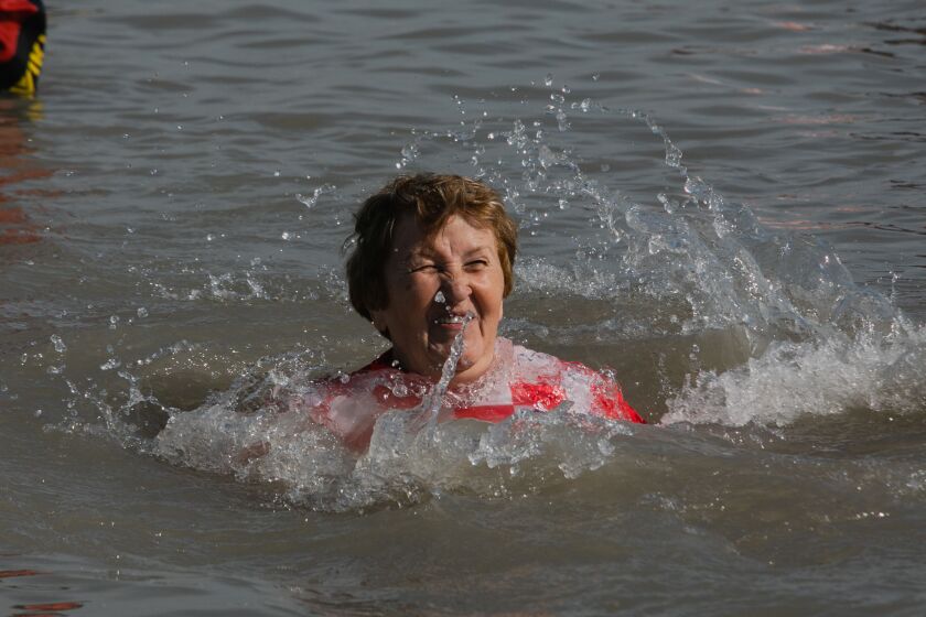 Thousands dive in the frigid waters of Lake Michigan at North Avenue Beach for the 20th annual Chicago Polar Plunge to benefit Special Olympics Chicago, Sunday morning, March 1, 2020.