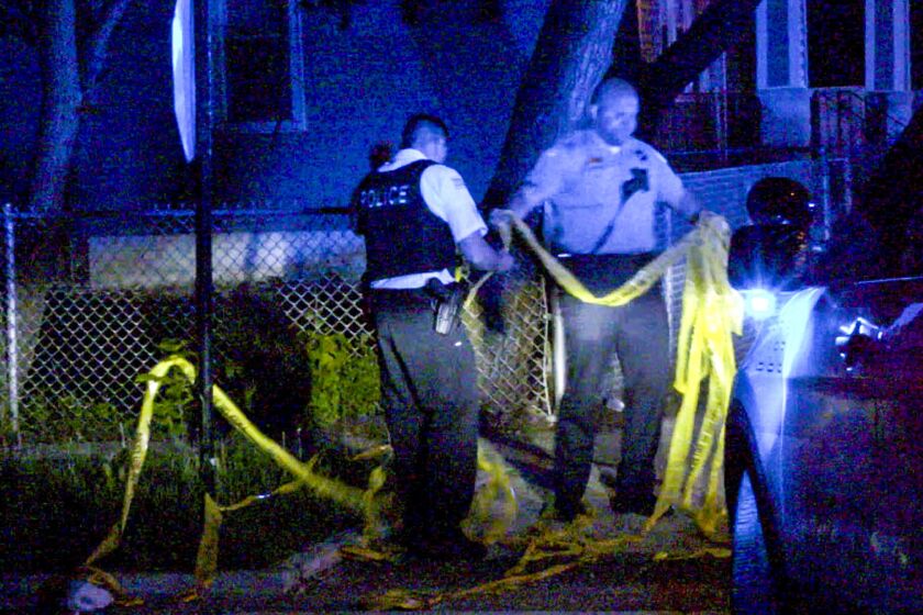 Police investigate a shooting about 11 p.m. Thursday, May 24, 2018 in the 11600 block of State St. in Chicago. | Justin Jackson/ Sun-Times