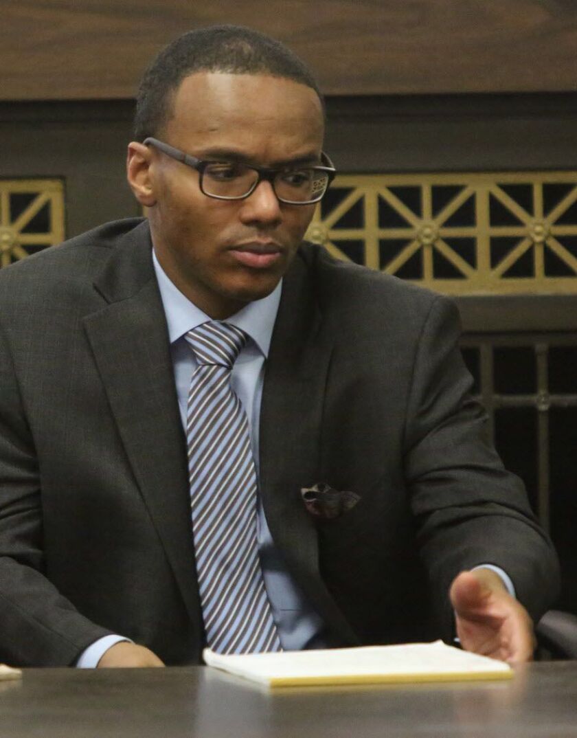Reginald Potts Jr. remains stoic as a sentence of life in prison is read by Judge Thomas Gainer on Tuesday in Chicago. | Chicago Tribune/Pool photo