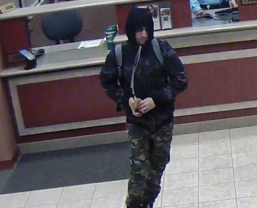 Surveillance photo of the suspect who robbed a South Loop bank Wednesday afternoon. | FBI
