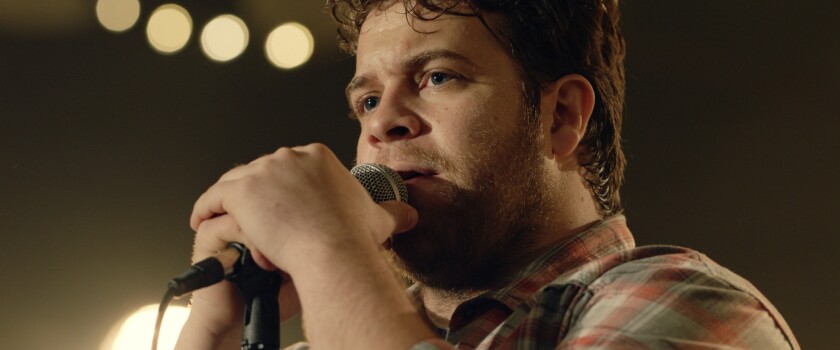 Bart Millard (John Michael Finley) performs with his band MercyMe in “I Can Only Imagine.” | LIONSGATE