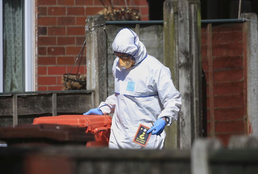 Police forensic investigators search the property of Salmon Abedi in connection with the explosion that took place at the Manchester Arena. The electoral register shows that Abedi – named by U.S. officials as the suspect in the suicide bombing at an Arian