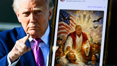 This photo illustration created on April 13, 2026 shows a picture of US President Donald Trump on a screen and an AI-generated picture he posted on his Truth Social platform depicting himself as Jesus Christ after criticizing Pope Leo XIV. Trump later posted an AI-generated image seemingly depicting himself as Jesus Christ. In the image, the president appears dressed in red and white robes as he cures a man with his healing hand. The American flag is shown over his shoulder. Trump and the White House have previously shared AI-generated images, including one that showed the president dressed as the pope.