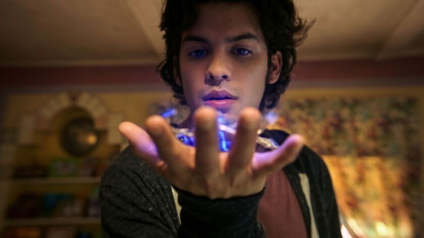 Xolo Maridueña plays Jaime, the college grad who acquires superpowers from a shiny blue scarab.