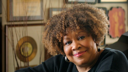 Mavis Staples is photographed in her South Side home with her numerous awards behind her.