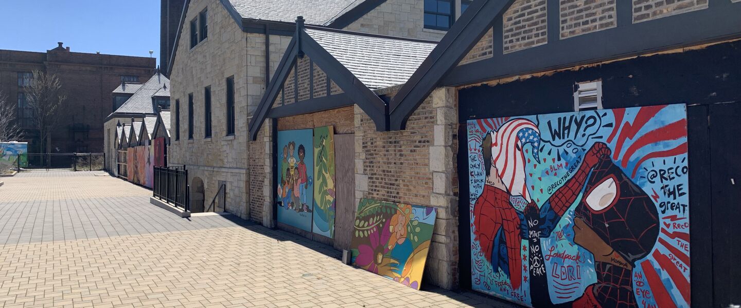 Among the murals on the DuSable Black History Museum and Education Center grounds is one showing Spider-Man characters painted by the Woodlawn artist who goes by “Reco the Great.” He says the imagery was about “unmasking the uncomfortable conversations” about race in America.
