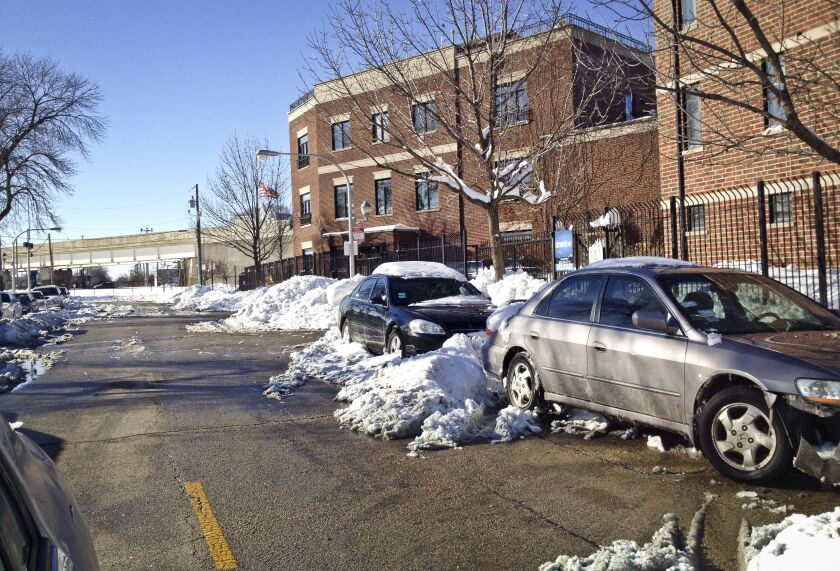 Ald. Edward Burke’s house on West 51st Street and the condo he developed next to it in February 2015 after a heavy snowstorm. | Dan Mihalopoulos/Sun-Times