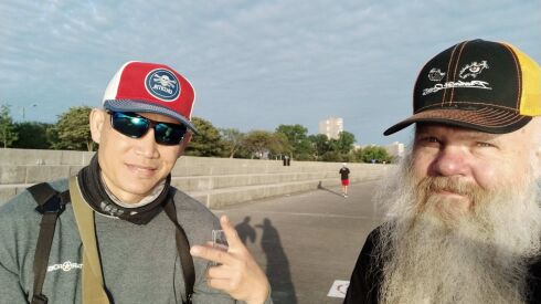 Meeting of the minds, Jason “Special One” Le (left) and Tim “Spike” Davis, while perch fishing at Montrose Harbor last week. Provided photo