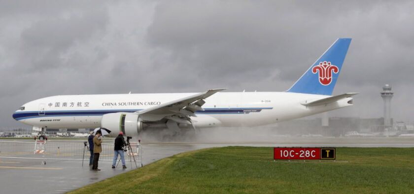 A China Southern Airlines cargo jet lands at O’Hare Airport. | AP