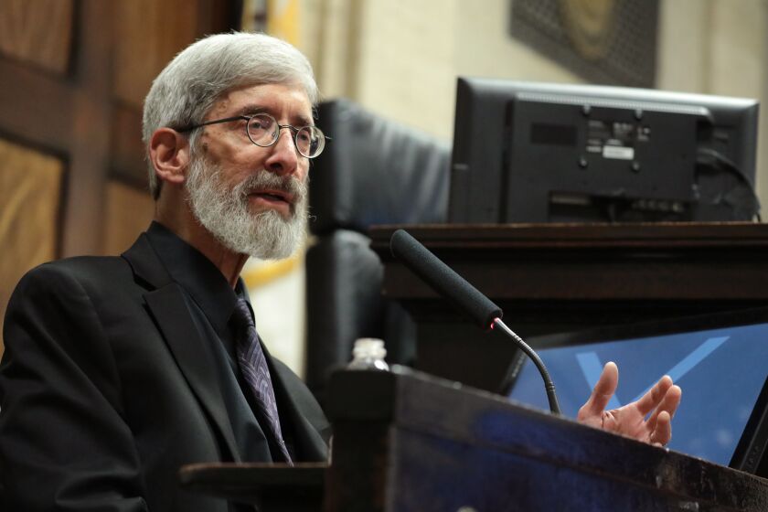 Dr. Laurence Miller testifies on Tuesday during the murder trial of Chicago Police Officer Jason Van Dyke trial for the shooting death of Laquan McDonald at the Leighton Criminal Court Building. | Antonio Perez/Chicago Tribune pool photo