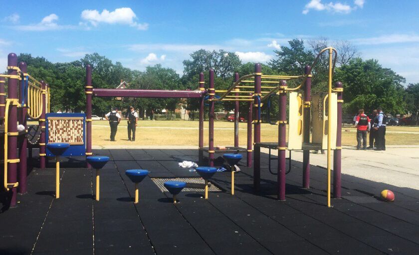 Two girls, ages 7 and 13, were shot Friday afternoon outside Warren Elementary school on the Far South Side during a picnic that was supposed to celebrate the end of the school year. | Francesca Gattuso/Sun-Times