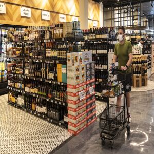 Customers shop on the opening day of Dom’s Kitchen and Market at 2730 N. Halsted St. in Lincoln Park on the North Side, Tuesday morning, June 8, 2021