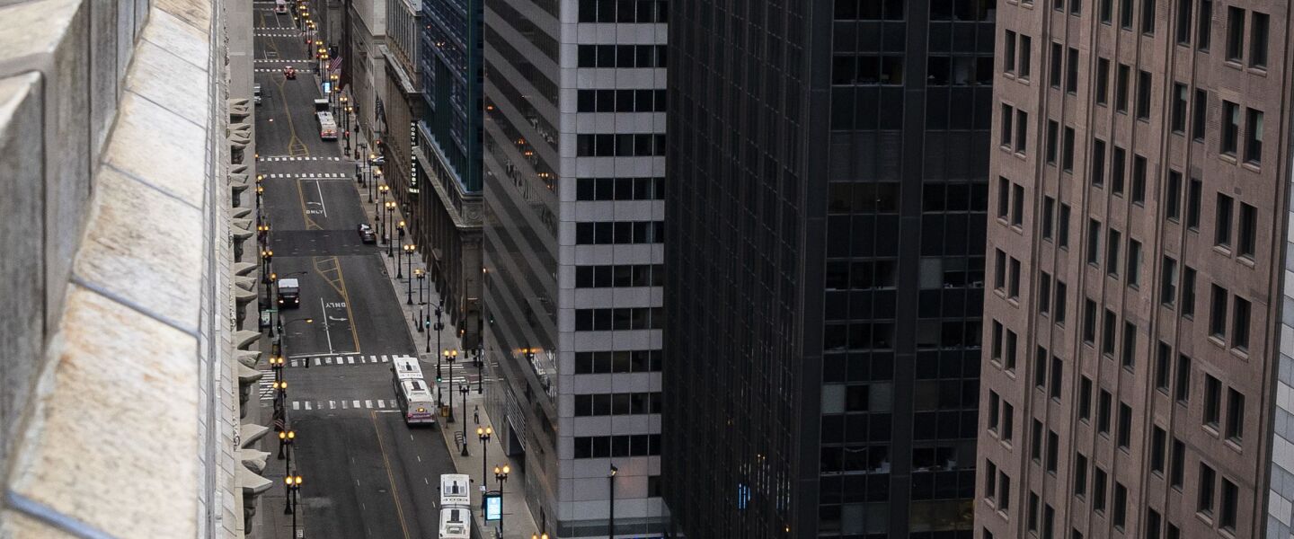 Amid fears of the coronavirus pandemic and a stay-at-home order from Gov. J.B. Pritzker, few pedestrians and minimal traffic could be seen in the Loop, looking south on North LaSalle Street from the roof of City Hall during the Wednesday morning commute, April 1, 2020.