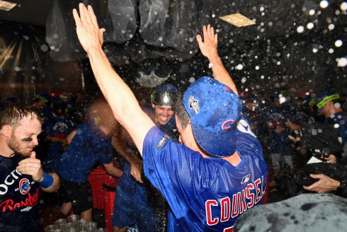 Manager Craig Counsell of the Chicago Cubs celebrates the team's 8-4 win over the Pittsburgh Pirates to clinch a spot in the National League playoffs at PNC Park on Sept. 17, 2025, in Pittsburgh, Pennsylvania.