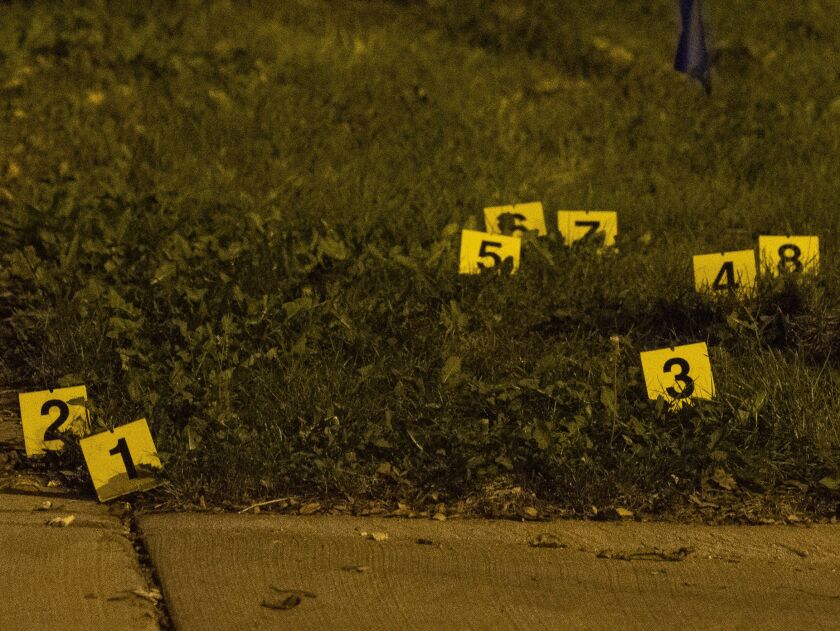 Police investigate the scene where a man was shot and killed Monday night in the 5700 block of South Winchester. | Tyler LaRiviere/Sun-Times