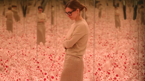 Wrightwood 659 assistant curator Ashley Janke in one of two mirror rooms by Yayoi Kusama, now on display at Wrightwood 659 in Lincoln Park.