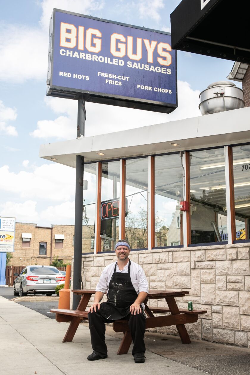 Big Guys Sausage Stand owner Brendan O’Connor sits outside the restaurant in Berwyn, Ill., Saturday, Sept. 17, 2022.