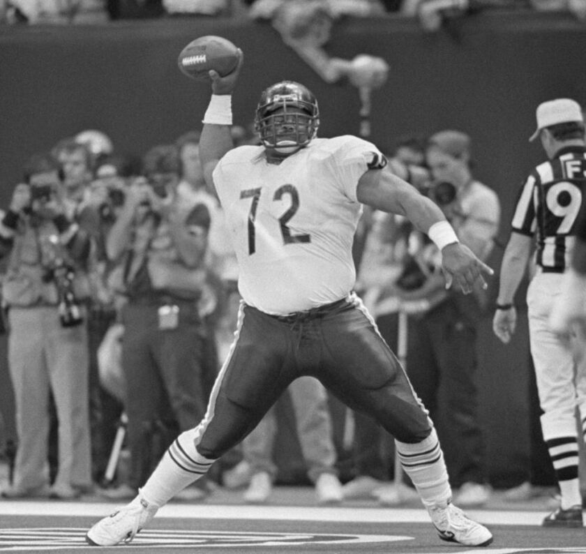 William Perry spikes the ball after scoring in Super Bowl XX. | AP