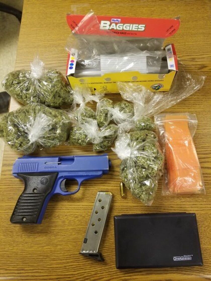 A gun reported stolen in DeKalb County and marijuana were recovered during a traffic stop Saturday night in the West Englewood neighborhood. | Cook County Sheriff’s Office