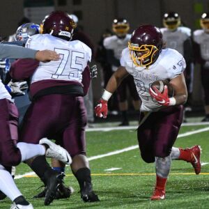 Solorio’s Eric Rodriguez (26) runs. Worsom Robinson/For the Sun-Times.