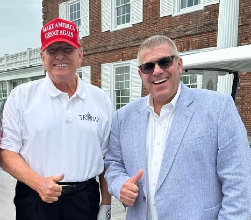 Darren Bailey and Donald Trump pose together for a photograph