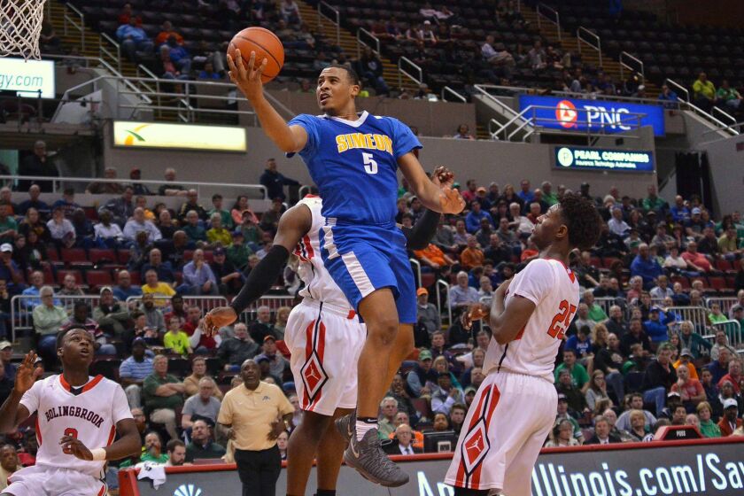 Talen Horton-Tucker (5) of Simeon glides to the basket against Bolingbrook. Worsom Robinson/ For the Sun-Times.